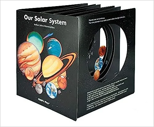 Black set of books about the solar system, "Our Solar System" written on the side.